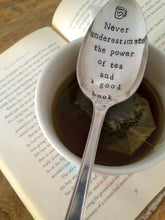Load image into Gallery viewer, "Never underestimate the power of tea (or coffee) and a good book"